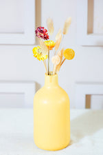 Bottle vase with summer breeze bunch